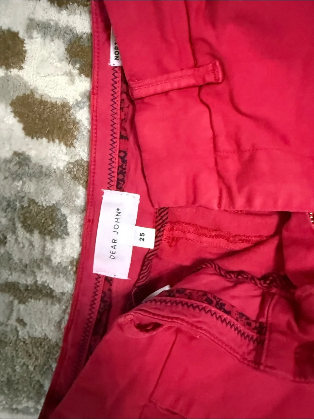 Dear John cuffed red Northampton shorts